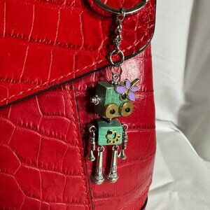 Steampunk-style robot key chain or pendent.